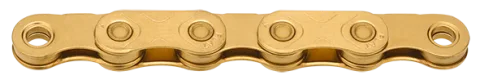 Grandinė KMC X FLAT TiN Gold Vaškuota 126L 12/13 Greičių