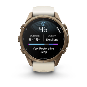 Garmin fenix 9 Pro - 43mm Tamsios auksinės spalvos titanas su kreminės / žalsvai pilkos spalvos silikoniniu dirželiu